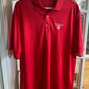 Nike Classic Red Polo Shirt with embroidered Robert Trent Jones Golf Trail logo